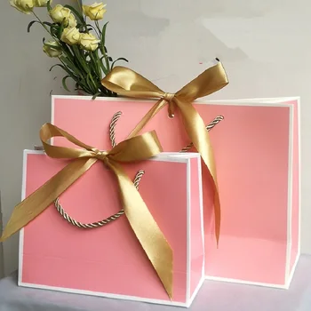 500 шт./лот Индивидуальный дизайн логотипа Роскошный Розовый бумажный пакет Подарочная упаковка Женская сумка-тоут для покупок с ленточными ручками